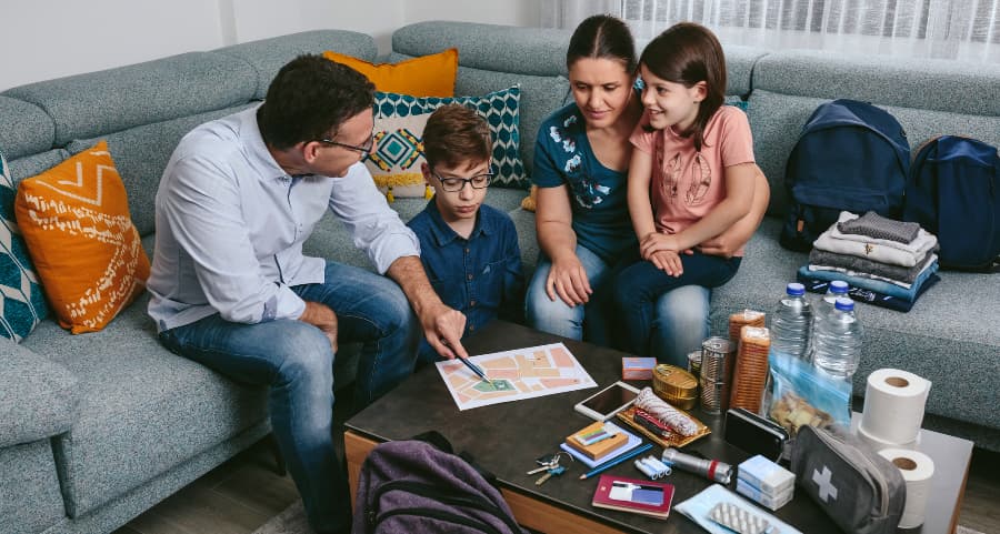 Dad showing family members where to go during an urgent event